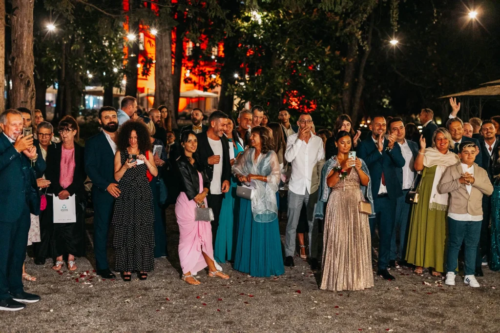 Guests celebrating with sparklers at night