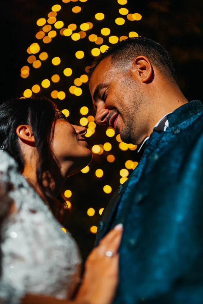  Bride and groom smiling close during a slow dance