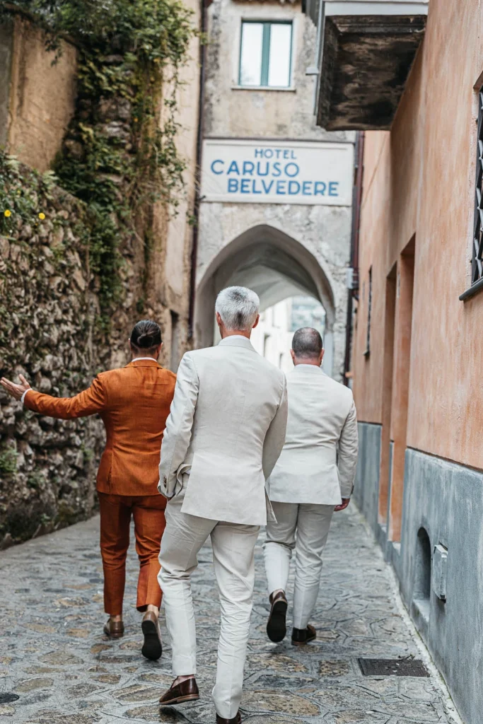 Ravello Wedding at Belmond Hotel Caruso – Amalfi Coast Destination Wedding 19 Couple walking through a narrow street in Ravello