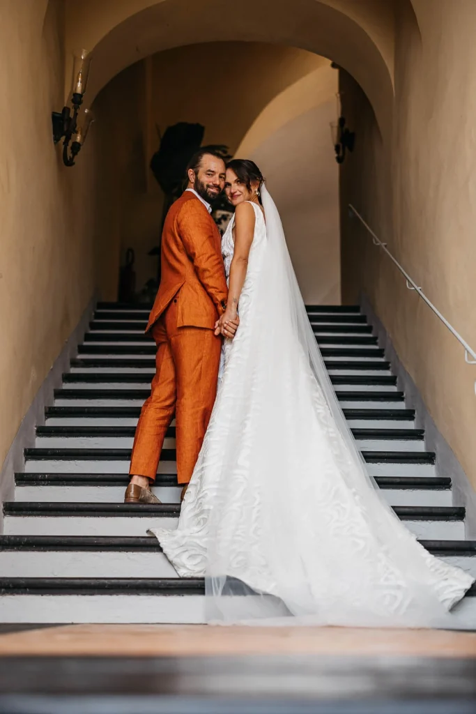 Ravello Wedding at Belmond Hotel Caruso – Amalfi Coast Destination Wedding 54 Bride and groom kissing at the top of a staircase