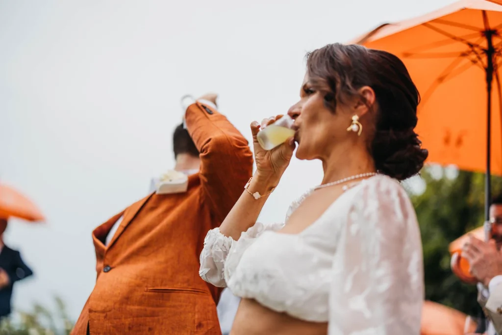 Ravello Wedding at Belmond Hotel Caruso – Amalfi Coast Destination Wedding 59 Bride lifting hands in celebration with guests