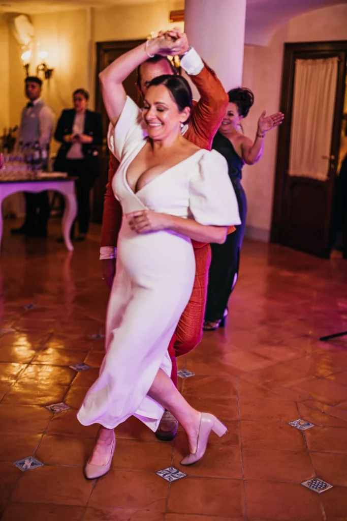Ravello Wedding at Belmond Hotel Caruso – Amalfi Coast Destination Wedding 73 Bride dancing barefoot in her wedding dress
