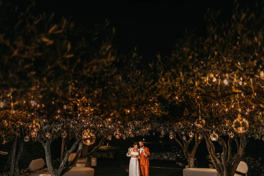 Ravello Wedding at Belmond Hotel Caruso – Amalfi Coast Destination Wedding 82 Newlyweds hugging under the olive trees