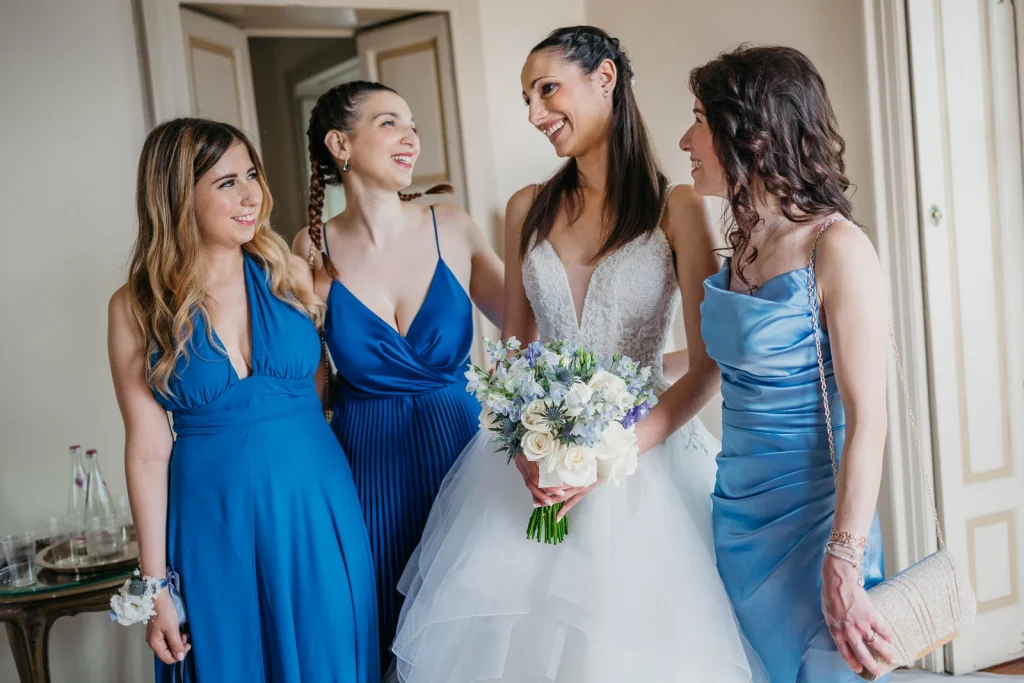 Dream Wedding at Villa Le Due Torrette in Erba: The Elegance of a Lake Como Celebration 21 Bride and father sharing a sweet moment before walking down the aisle