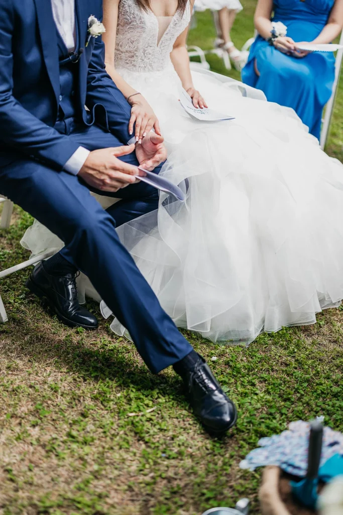 Dream Wedding at Villa Le Due Torrette in Erba: The Elegance of a Lake Como Celebration 39 Bride and groom seated during the wedding ceremony