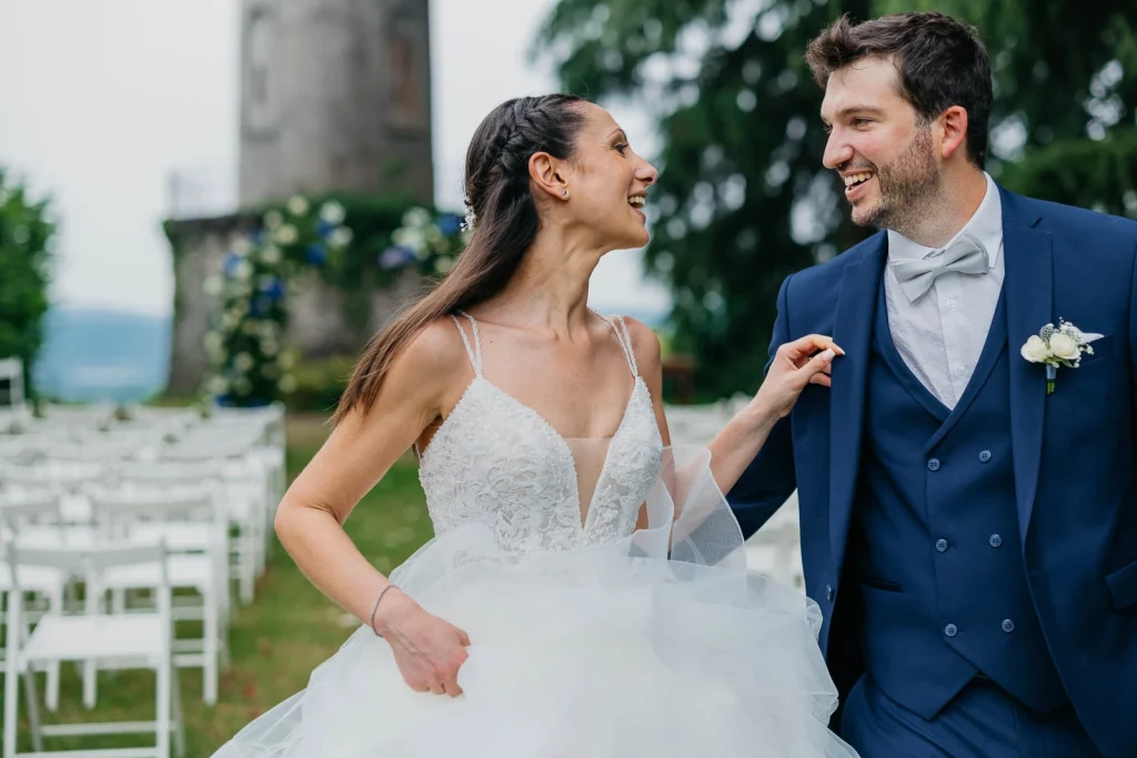 Dream Wedding at Villa Le Due Torrette in Erba: The Elegance of a Lake Como Celebration 51 Bride smiling at groom in a candid romantic moment at Villa Le Due Torrette