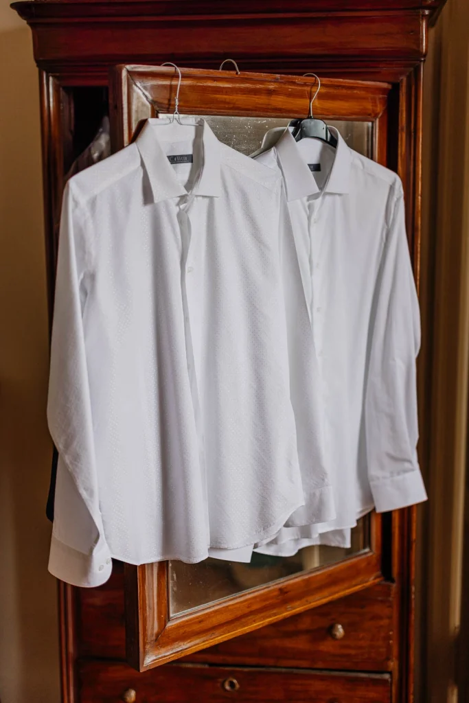 Dream Wedding at Villa Le Due Torrette in Erba: The Elegance of a Lake Como Celebration 7 Groom’s shirts prepared for the ceremony at Villa Le Due Torrette