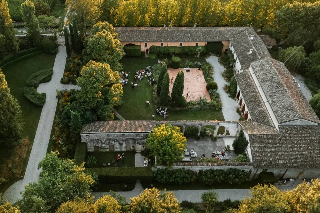 Aerial view of Convento dell’Annunciata surrounded by forest and gardens