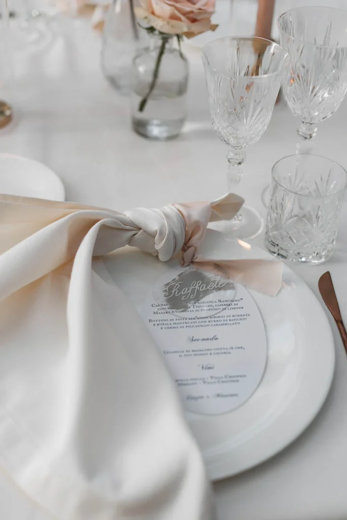 Floral centrepiece with soft pastel roses on the forest banquet table